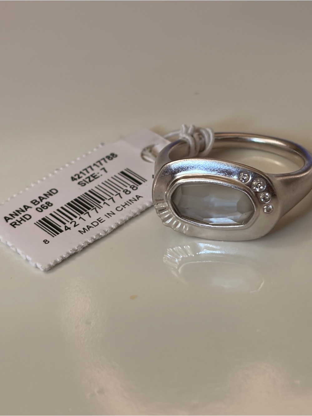 Kendra Scott Silver Ring with White Faceted Stone and Crystal Accents